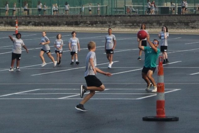 Recently, Mr. Mead’s class took a day off from intense workouts of sit-ups and squats to play kickball.